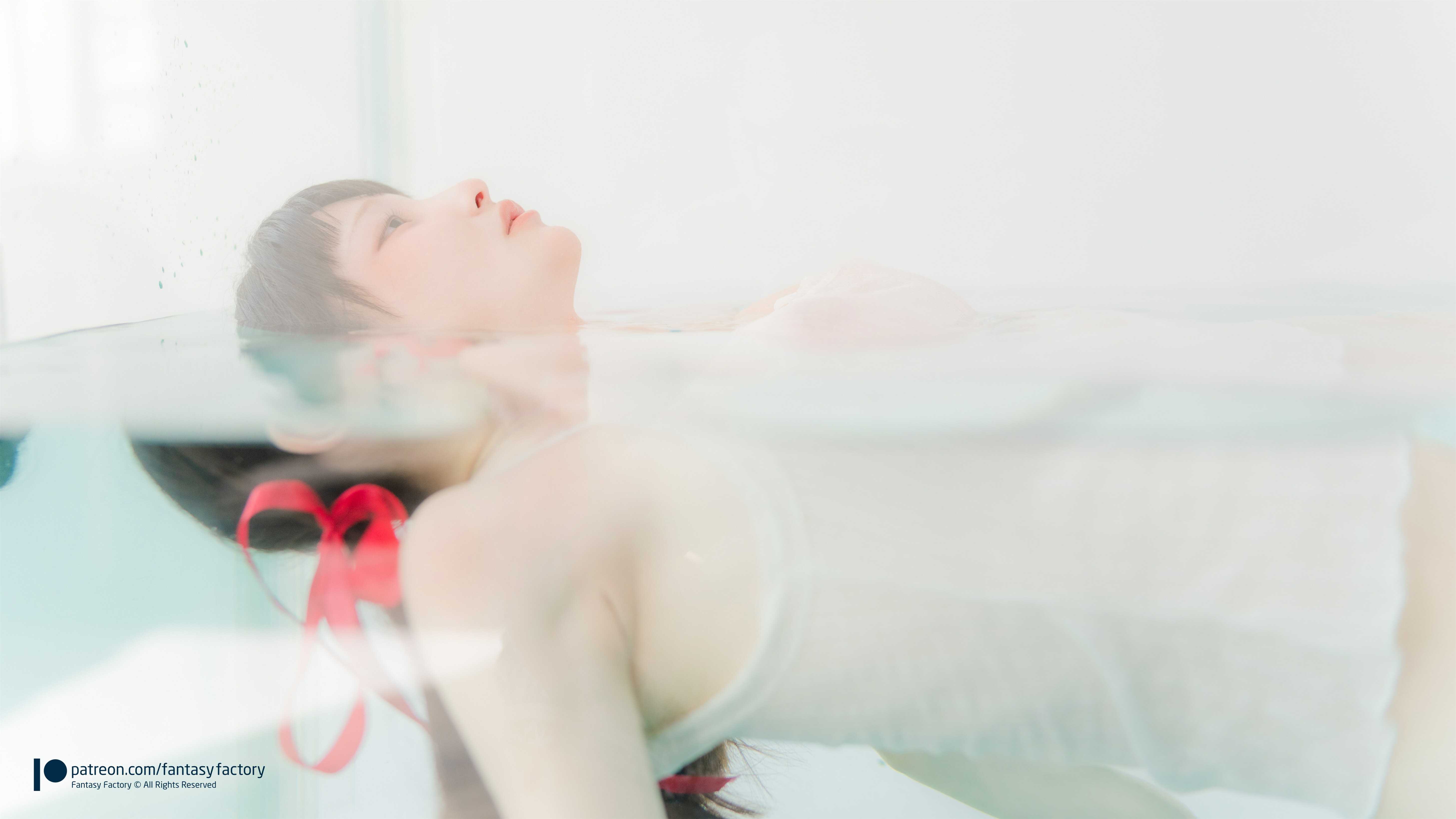 Komachi Red ribbon in water Komachi Red ribbon in water