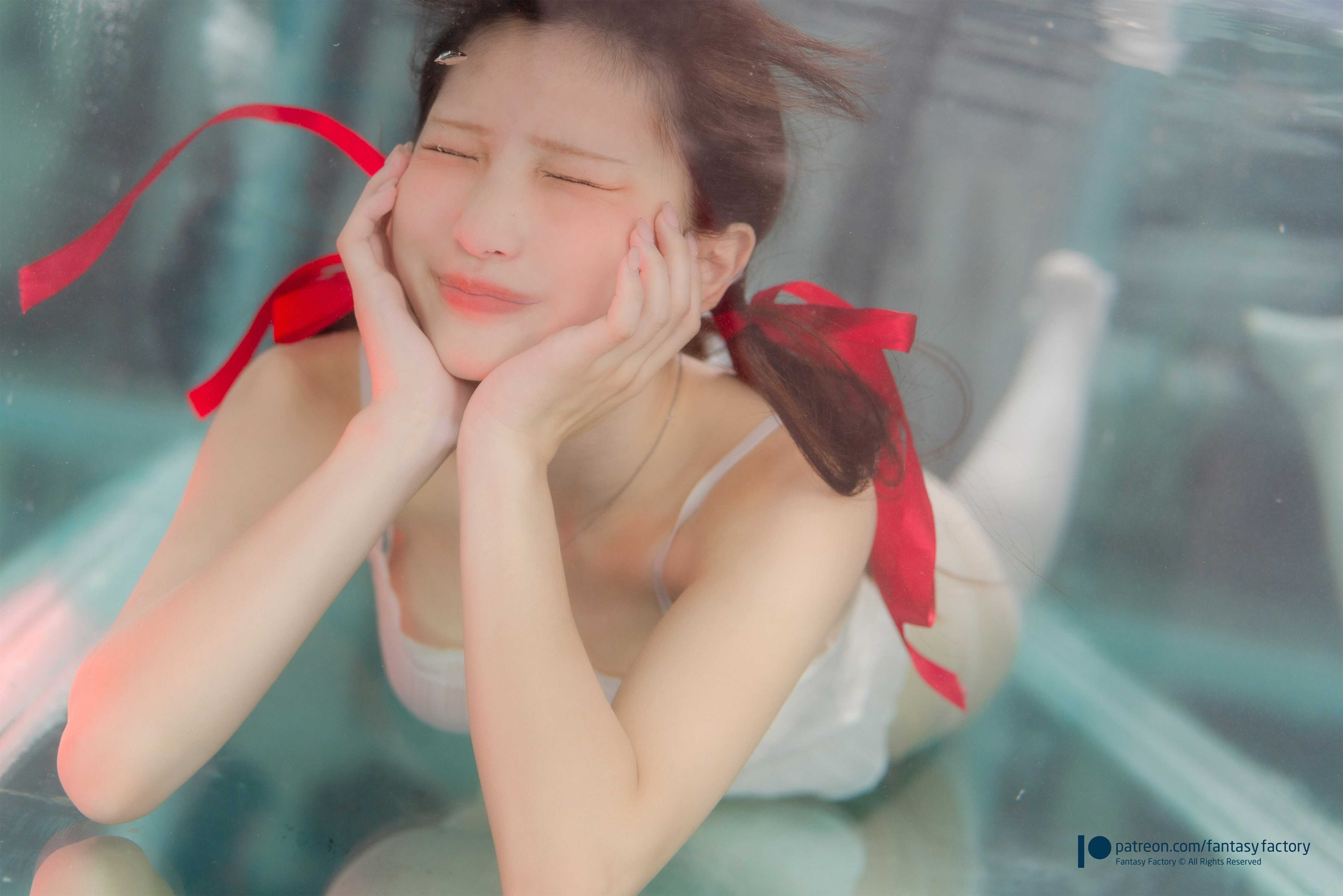 Komachi Red ribbon in water Komachi Red ribbon in water